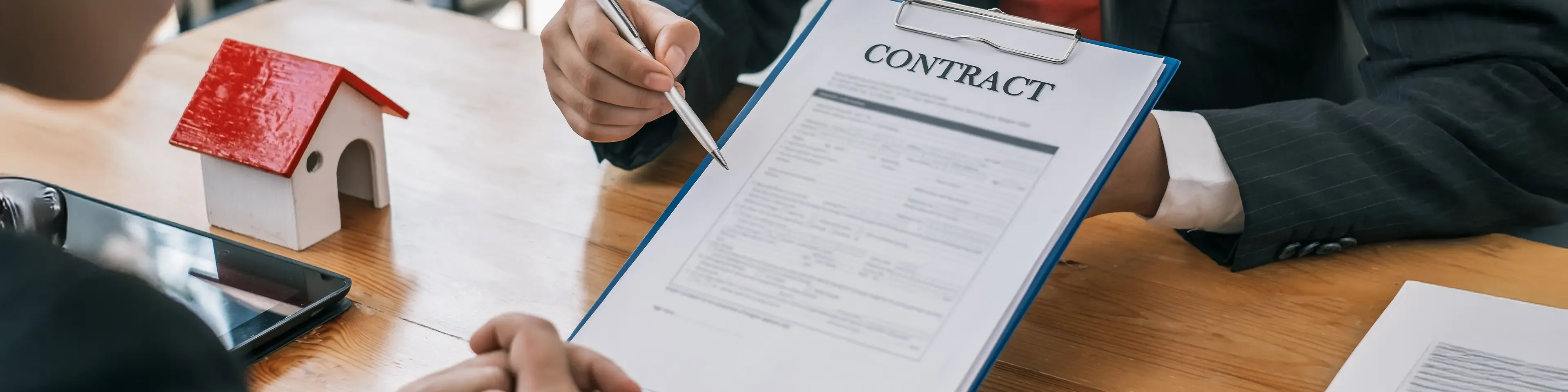 signing a Dubai tenancy contract on a desk